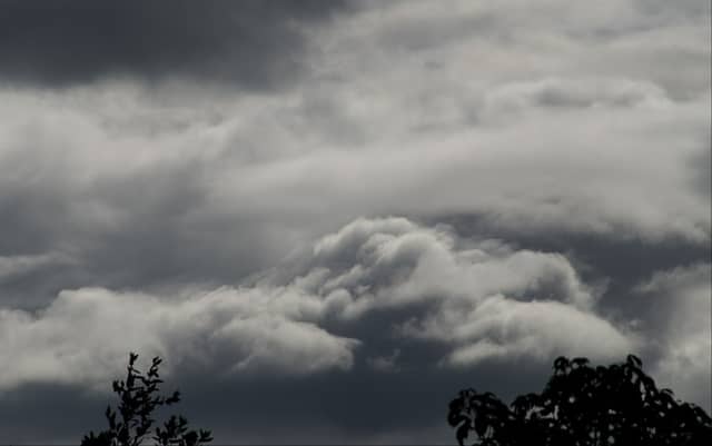 Dull and damp with rain gradually easing through the day