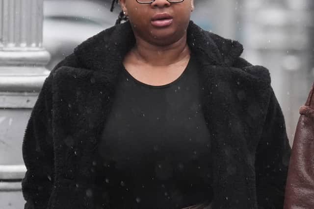 She said she remembered the door already being open when she came downstairs and when she first saw George he was lying on his back outside the house while holding a knife and pulling Taser wires out of his body.