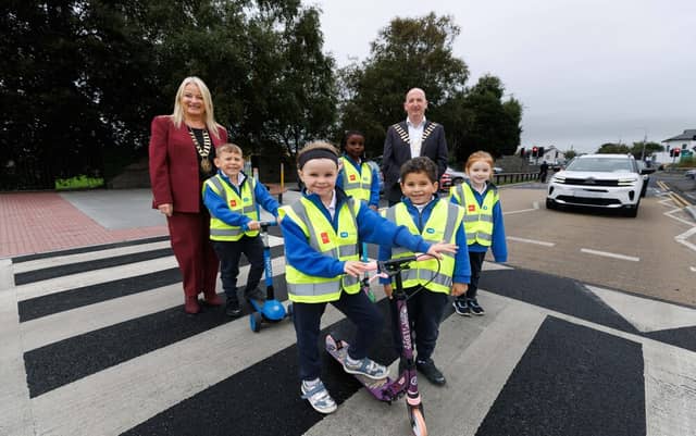 Pictured (L-R): Cllr Mary Howard, Mayor of Ennis; Cllr Paul Murphy, Cathaoirleach, Clare County Council and Holy Family Junior School pupils
