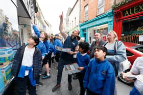 John Beattie, Architectural Conservation Advisor, pointing out the sites around Ennis to pupils of Holy Family School, Ennis after the launch of the Wonder Wander Ennis trail | PICTURES: Eamon Ward