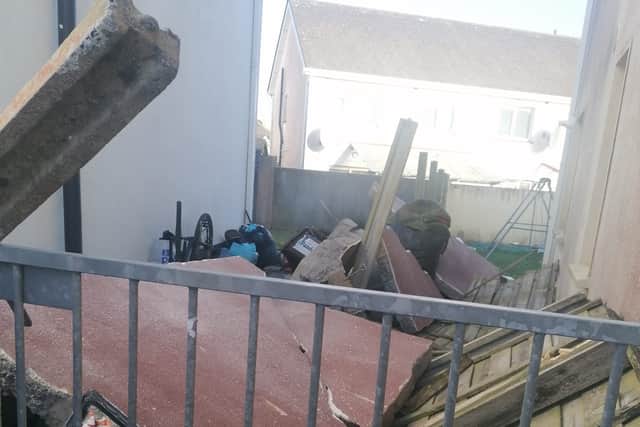 She went outside to discover a pile of bricks and slates on the ground after the gable end of their home had given way.