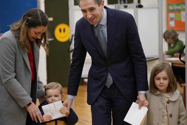 The Fine Gael leader arrived at the polling station at Delgany National School in Co Wicklow just before 7.30am with his wife Caoimhe and their children, Saoirse, five, and Cillian, three.