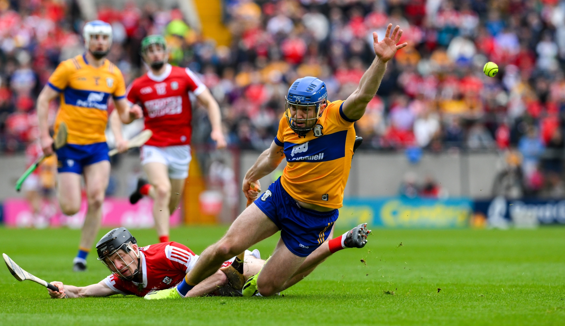 Shane O'Donnell of Clare tackled by Eoin Downey of Cork during the Munster Senior Championship Round 2 match in April|PICTURE: Ray McManus/Sportsfile