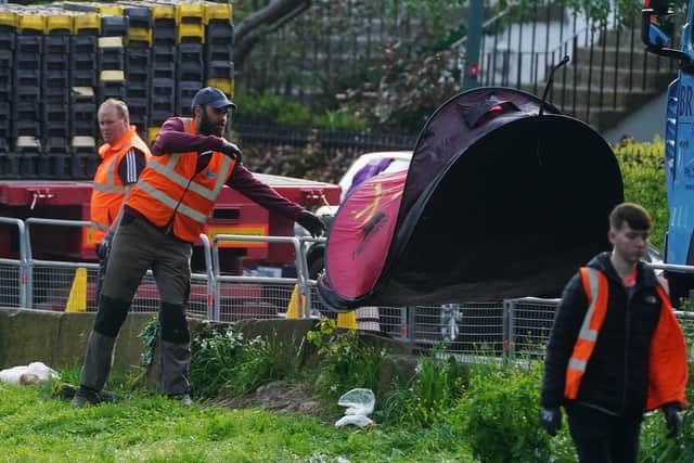 By approximately 8am, all the tents had been removed using a truck with a crane arm.