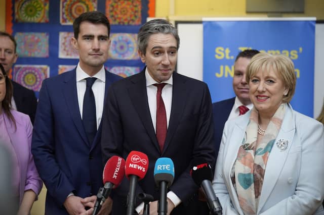 Taoiseach Simon Harris pictured with Minister Jack Chambers and Minister Heather Humphreys at St Thomas' Junior National School in Esker, Lucan, Co Dublin