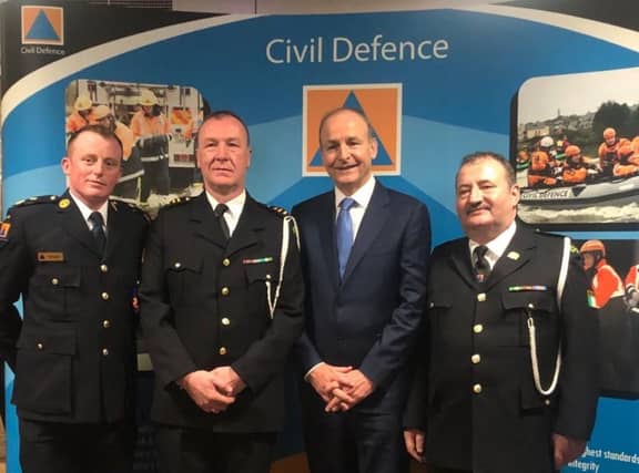 Steven Hayes, Civil Defence Officer, First Officer Shane Moylan; Tánaiste and Minister for Defence Micheál Martin TD, First Officer Brendan Fitzgerald | PITURE: Clare Civil Defence