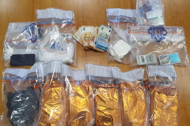 Approximately six kilos of benzocaine (a suspected mixing agent for cocaine) was also seized in addition to a compressor for packaging and a small amount of 9mm ammunition.