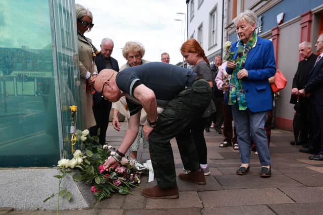 On Tuesday, a number of families who lost loved ones in the 1998 attack, gathered and laid flowers at the spot where the bomb exploded.