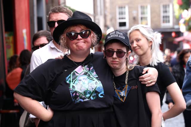“She kicked down the barriers in her Doc Marten boots, bald-headed deliverer of unwanted truths,” the speaker read.
