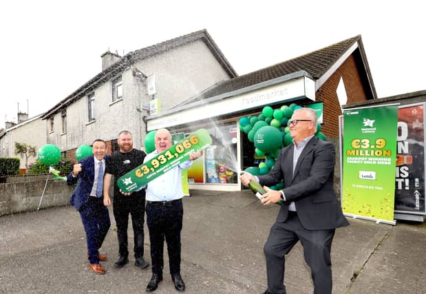 Shop owner David Fitzgibbon and staff member Joey Kelly were celebrating at Pinewood Stores in Balbriggan, Co Dublin | PICTURE: MacInnes Photography
