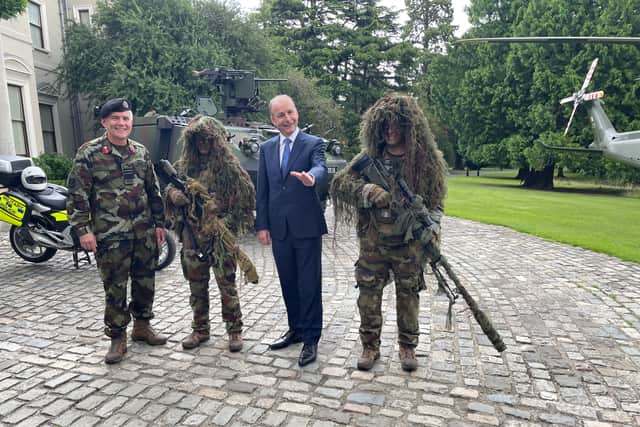 The Tanaiste was speaking at a Defence Forces Open Day in Farmleigh House in Dublin to encourage people to join the Irish army.