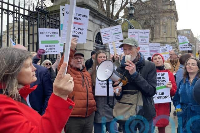 Dozens of tutors gathered at the gates of Leinster House earlier this week to call for public sector contracts and protest against working conditions.
