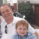 Andrew McGinley with the three deceased children, Conor, Darragh and Carla.