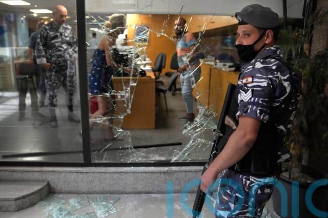 Ms Hafez eventually left with cash in a plastic bag, witnesses said.