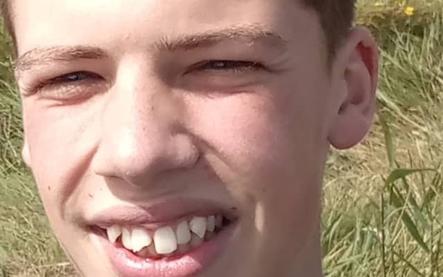 James is described as being 6 foot in height, of slim build, with brown hair