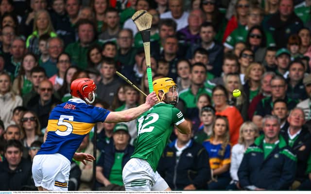 Tom Morrisey of Limerick is tackled by Dillon Quirke of Tipperary during the Munster GAA Hurling Senior Championship Round 3 match between Limerick and Tipperary at TUS Gaelic Grounds in Limerick.