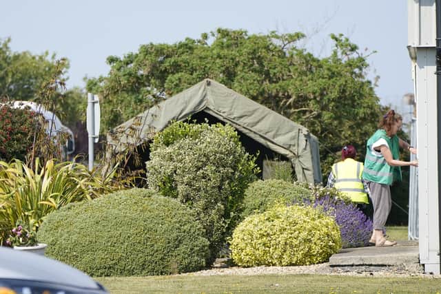 Some 150 people were to arrive on Tuesday, most of whom were expected to be families.