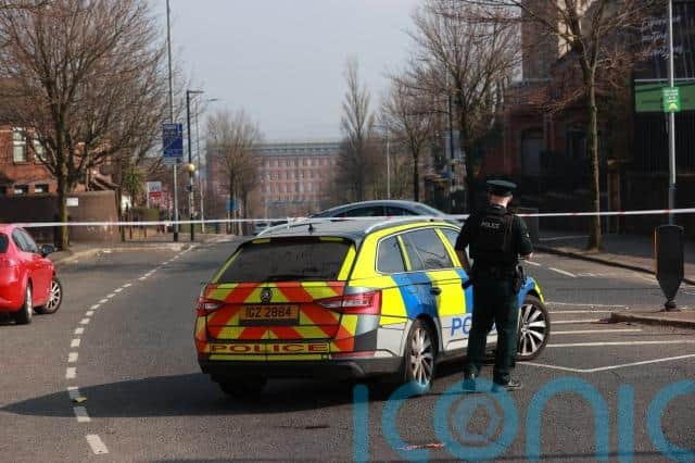 Police said the driver of a van was threatened by two gunmen and forced to drive a device, which he believed to be a live bomb, to the church.