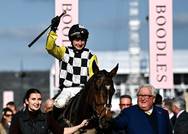 Malcolm Denmark (right) leads his horse The Nice Guy into the winner's enclosure at Cheltenham PIC: Sportsfile