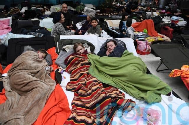 Tatyana, 58, who would not give her last name, came with her daughter Anna, 37, and Anna’s daughters Katya and Kira, who are aged six and one. They are from Kharkiv, about 600 miles from the shelter.