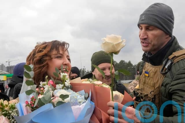 Lesia Ivashchenko and Valerii Fylymonov, both members of the Ukrainian Territorial Defence Forces, were married at a checkpoint in Kyiv on Sunday.
