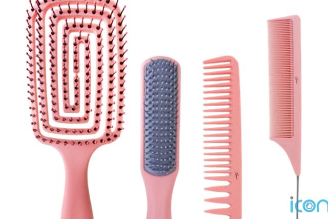 For all your blow-drying and hair-styling needs, we love the pink and purple brush and comb set.