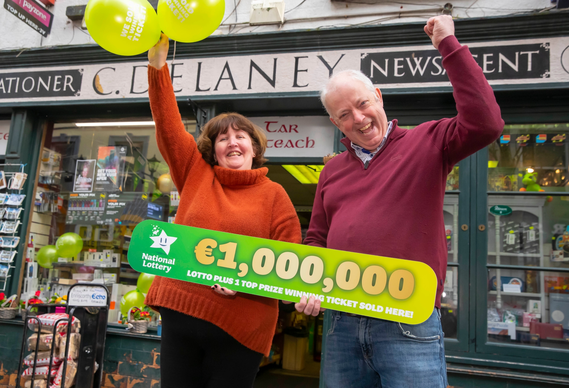 Staff at Delaney’s Newsagents in Enniscorthy, Co. Wexford celebrate after selling the winning ticket