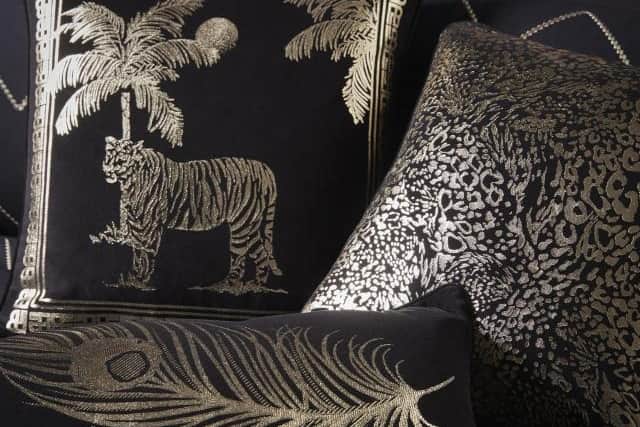 9. Laurence Llewelyn-Bowen Tiger Tiger Black Cushion, £18, Dunelm