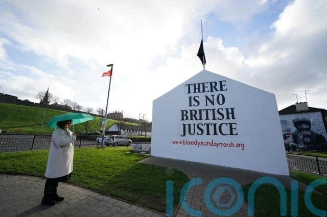 A choir sang Danny Boy while images of the 1972 march and subsequent justice campaigns, as well as the Saville inquiry ruling, were displayed in the background.
