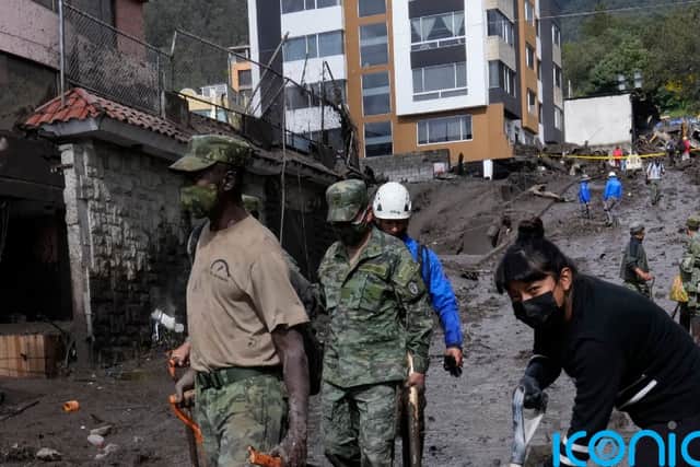 The rescue agency initially reported 14 known dead, but Metropolitan District police Commander Cesar Zapata later told Ecuavisa television that four more victims had been found.