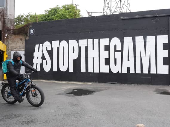 A mural calling for the fixtures to be called off in Dublin