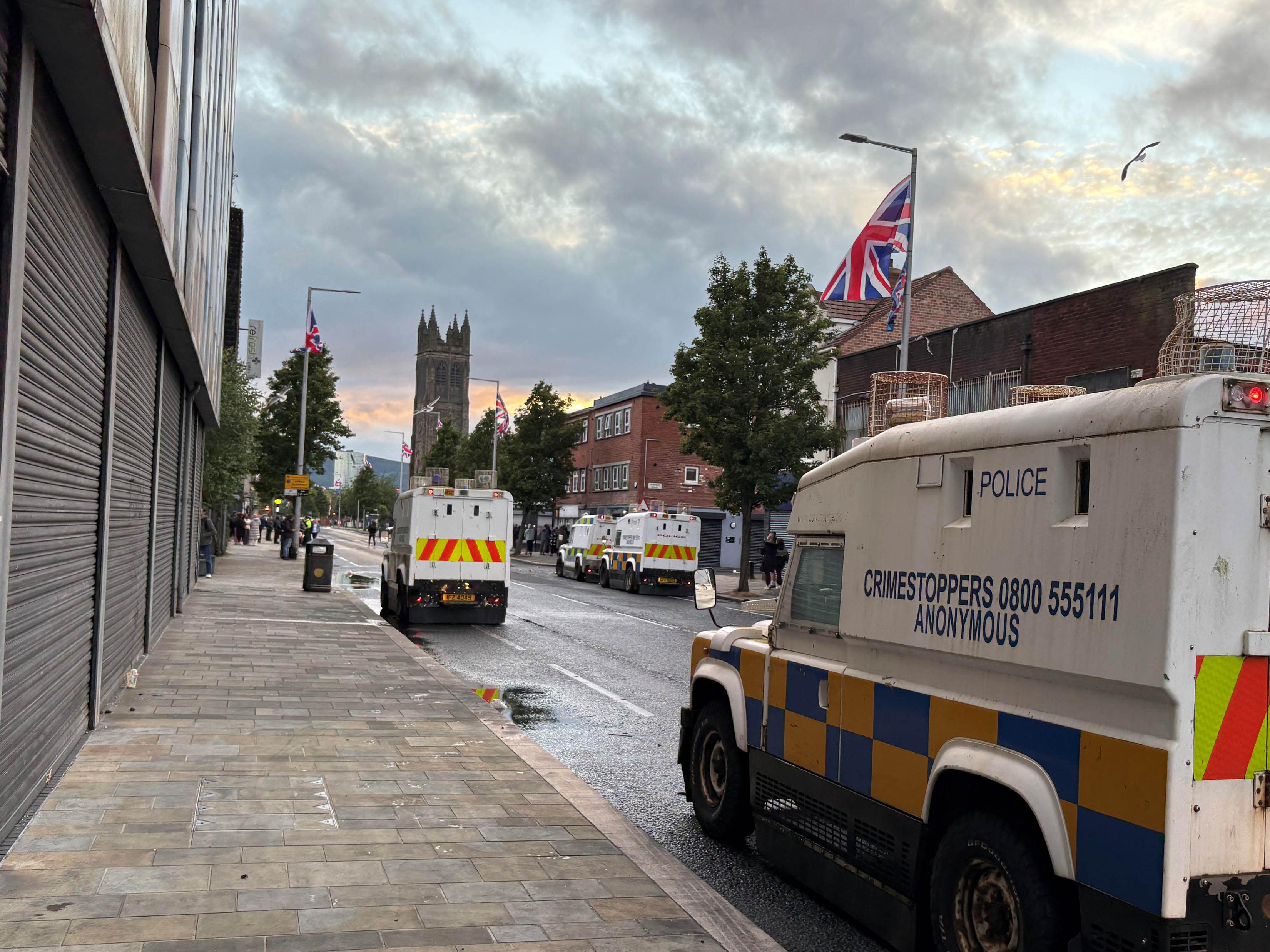 Police vehicles on the Newtownards Road in east Belfast