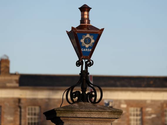 The Garda logo on a lamp at the entrance to Garda Headquarters in the Phoenix Park, Dublin
