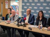 Fórsa general secretary Kevin Callinan (centre) speaking at the union's headquarters in Dublin