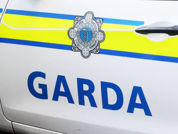 The Garda badge logo