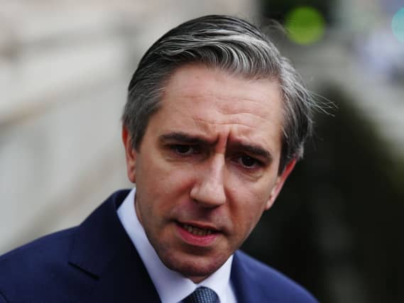 Headshot of Simon Harris speaking
