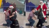 WATCH: Magical moment Santa Claus walks by marriage proposal in Dublin Airport