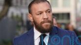 McGregor settles with former sparring partner over whiskey company dispute
