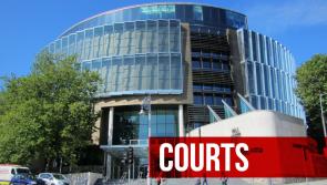 Man jailed for assisting his wife in the management of a massage parlour that provided 'happy endings'