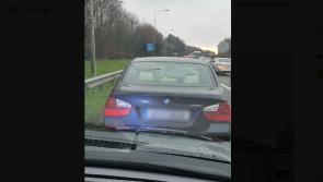 Disqualified driver arrested after he was caught &lsquo;whizzing&rsquo; up a bus lane