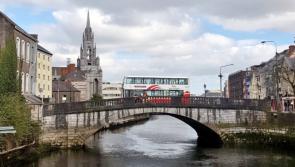Two people hospitalised in car crash at Cork bridge as chunk of wall knocked into river