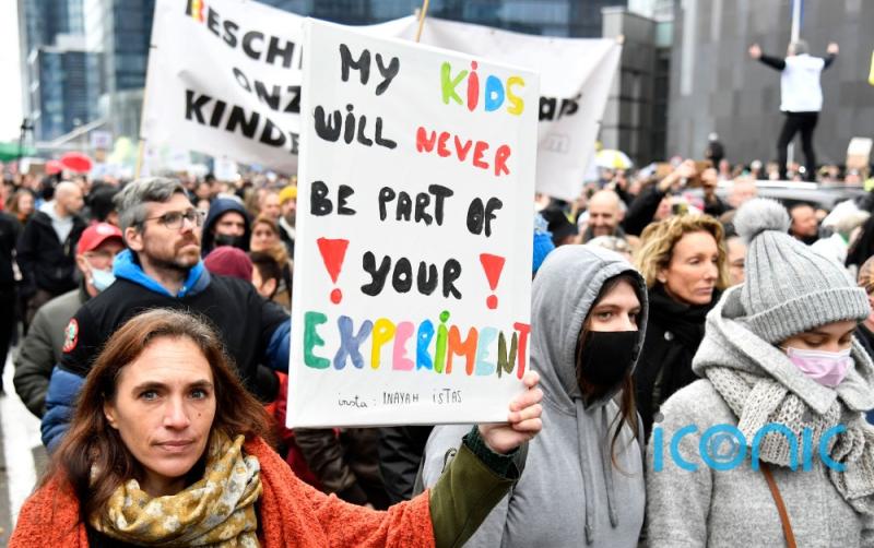 Police use water cannons and tear gas on Covid protesters in Belgium 